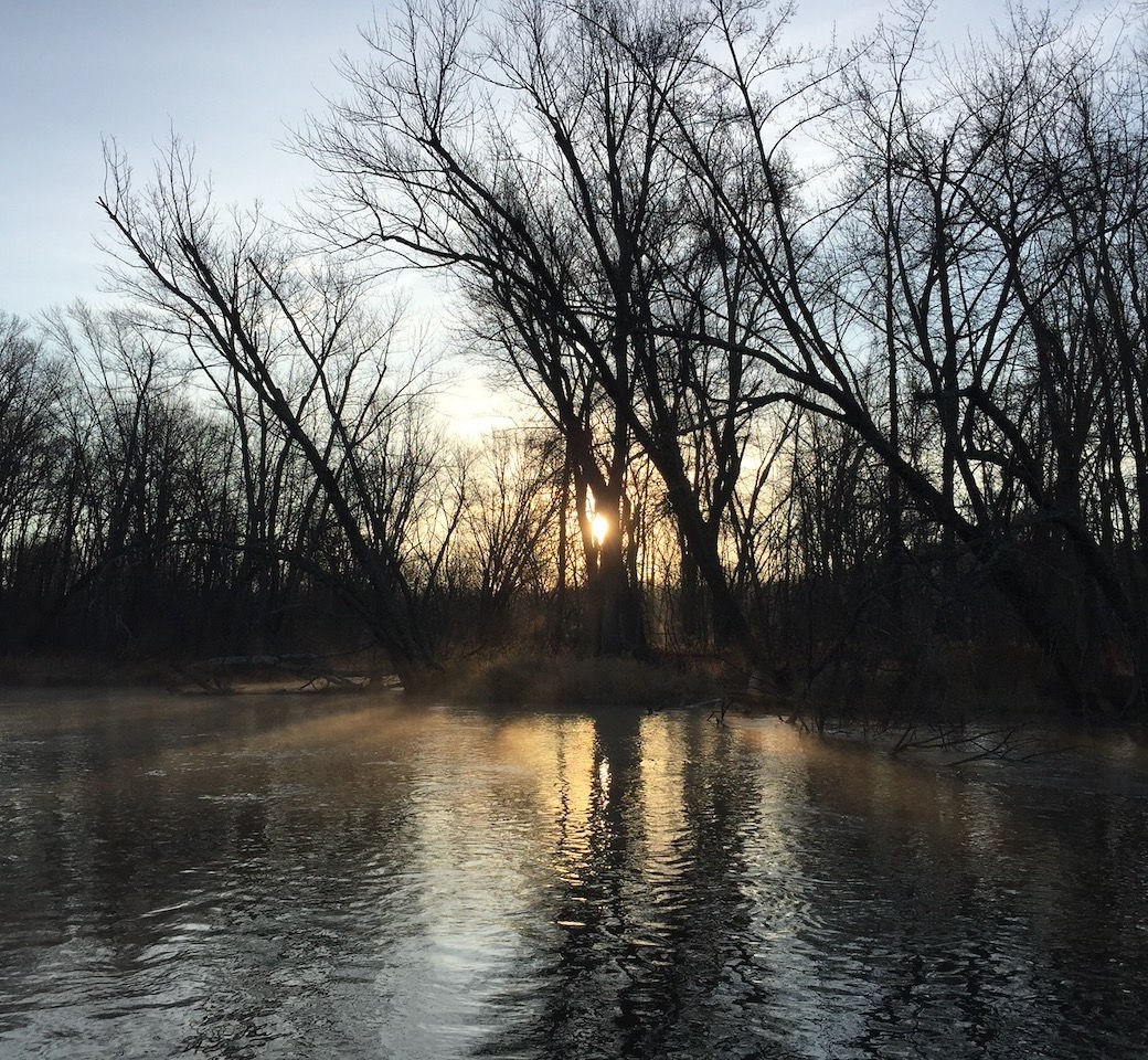 Misty river at sunrise